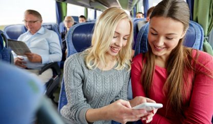 girls-on-bus | TOK Coachlines